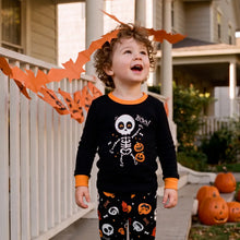 Load image into Gallery viewer, Glow in the dark Halloween dancing skeleton pajamas