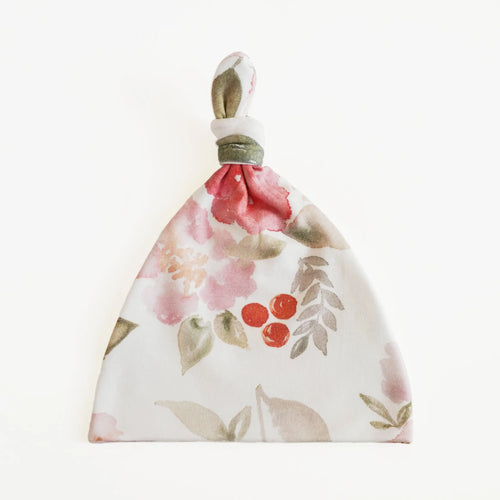 Painted petals top knot hat
